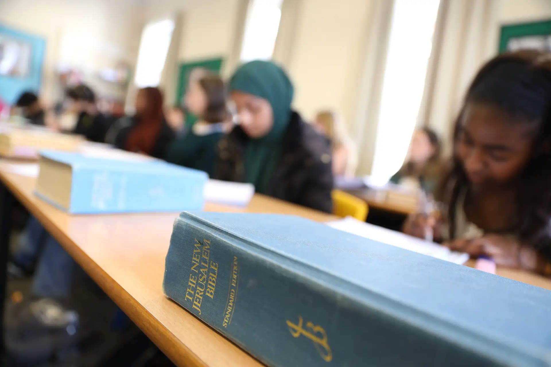 student reading the book